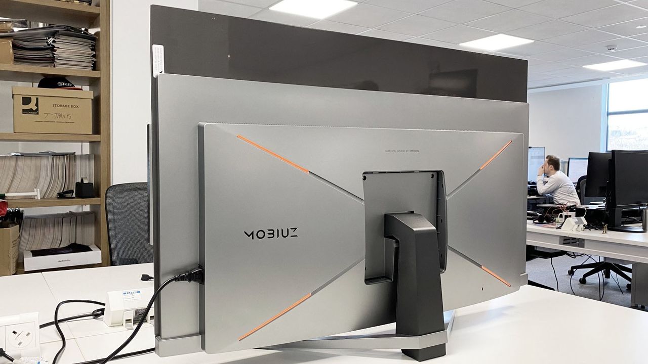 BenQ Mobiuz EX480UZ in an office setting