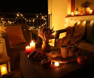 Solar lights and candles on a porch