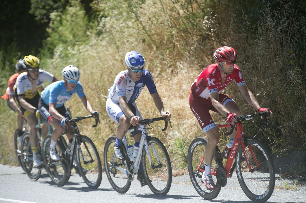 Michael Morkov sitting on the front of the peloton