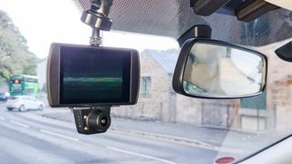 Car & Driver Road Patrol Touch Duo dash cam mounted in car