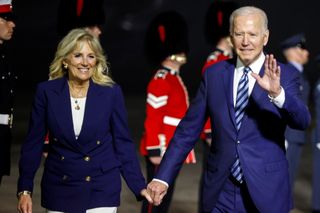 U.S. President Joe Biden and first lady Jill Biden react upon arrival at Cornwall Airport on June 9, 2021 near Newquay, Cornwall, England.