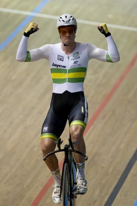 Alexander Edmondson celebrates after winning his gold medal during the Men's Individual Pursuit final