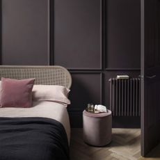 A bedroom painted in dark aubergine 'Pontefract' paint by Paint & Paper Library