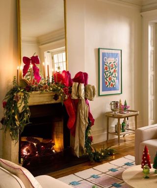 anthropologie holiday house in new york mantel decorated with large bows