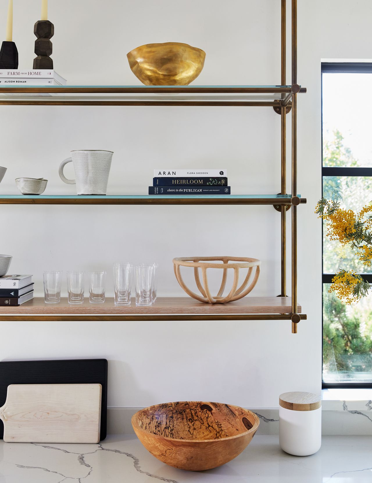 A kitchen with wall storage