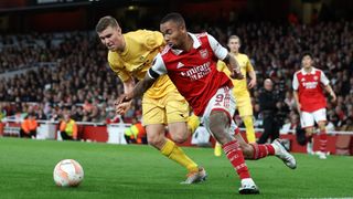 Alfons Sampsted of FK Bodo/Glimt in action with Gabriel Jesus of Arsenal