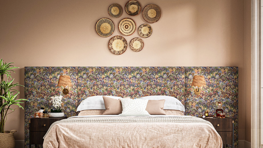 Bedroom with extended patterned cushioned headboard idea