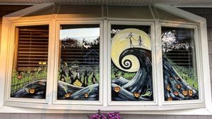 Halloween window ideas depicting Nightmare Before Christmas scene on bay windows