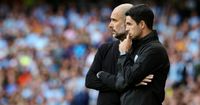 Arsenal manager Mikel Arteta and Manchester City boss Pep Guardiola look on during the Premier League match between Manchester City and Tottenham Hotspur at Etihad Stadium on August 17, 2019 in Manchester, United Kingdom.