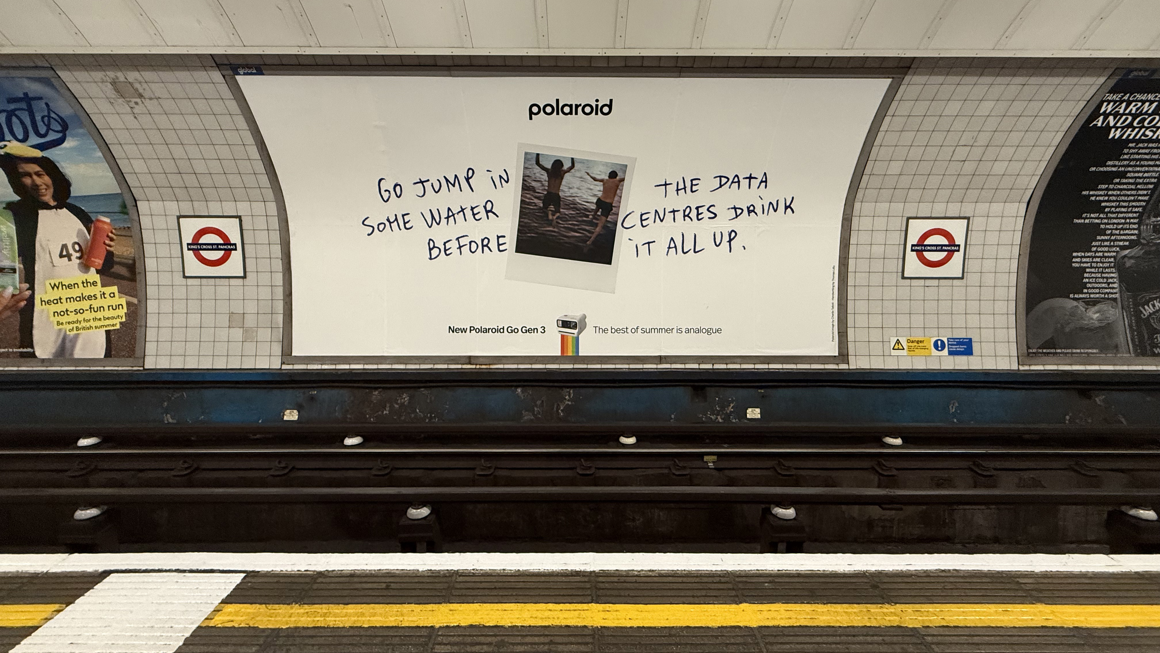 A Polaroid billboard encouraging an analog summer