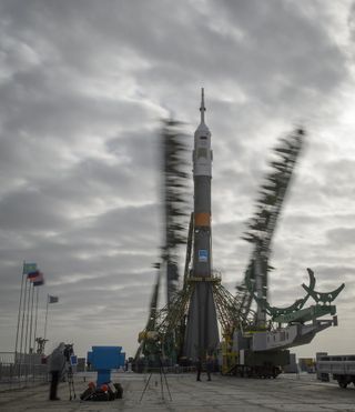 Gantry Arms Closing Around the Soyuz TMA-12M Spacecraft