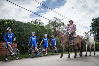 Riders stop for a chat with some of the locals.