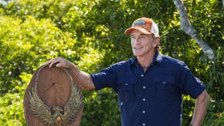 Jeff Probst posing with the Immunity Necklace during Survivor 50's finale.