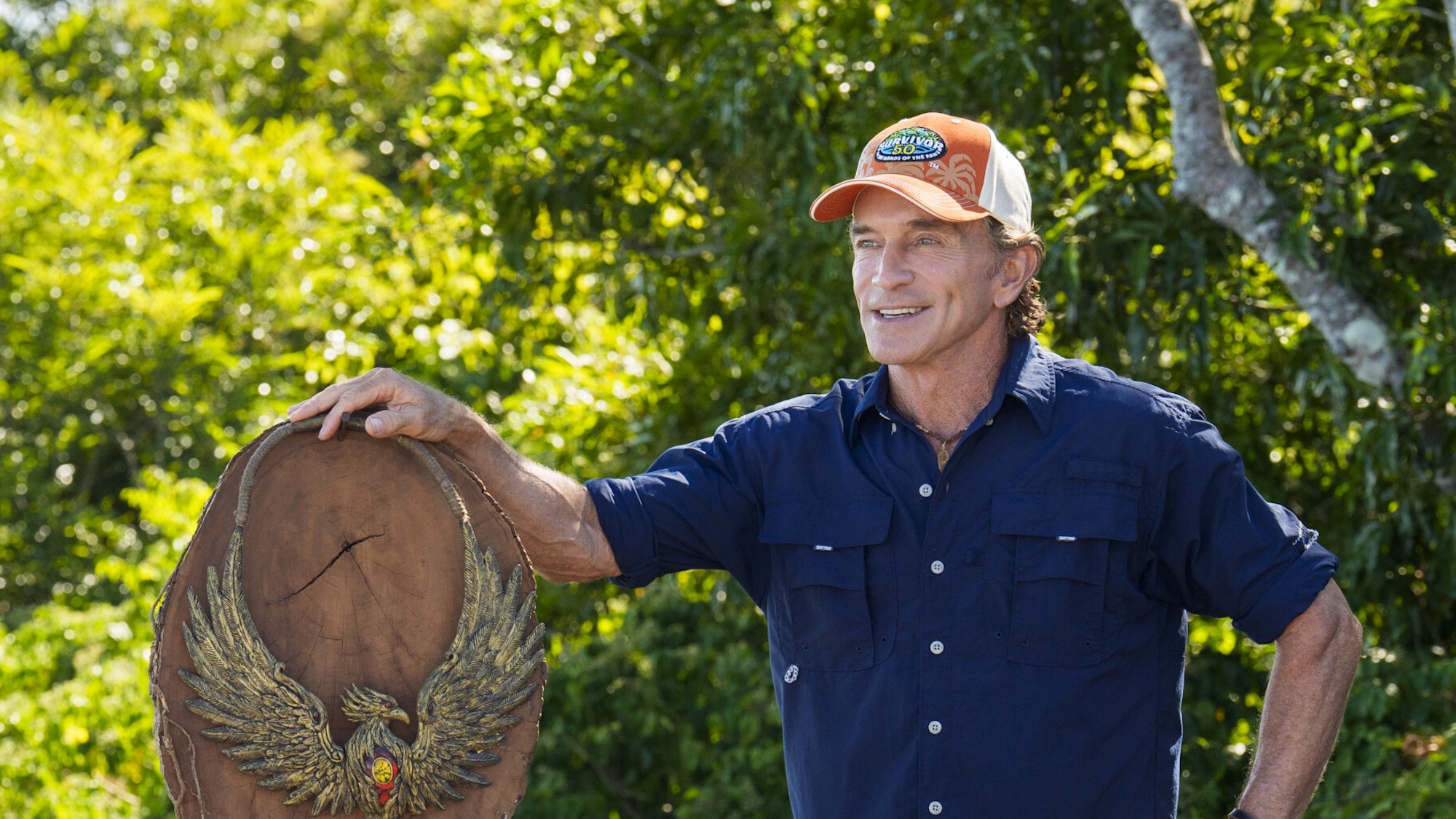 Jeff Probst posing with the Immunity Necklace during Survivor 50's finale.