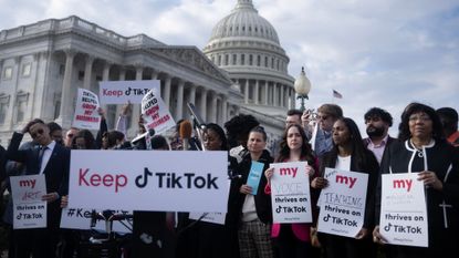 People gather for a press conference about their opposition to a TikTok ban on Capitol Hill in Washington, DC