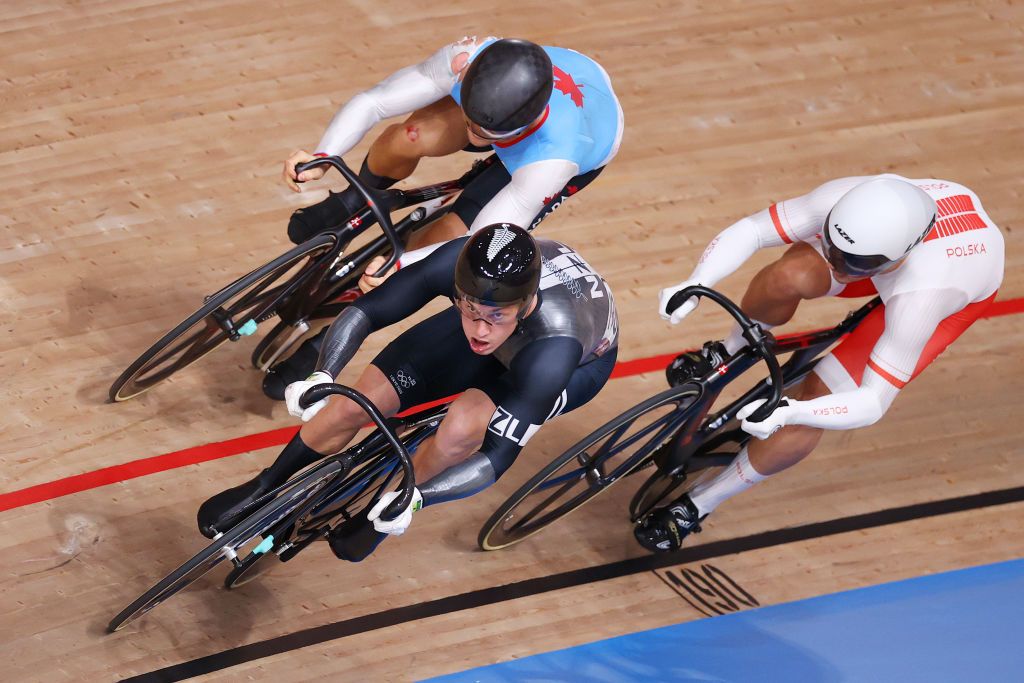 IZU JAPAN AUGUST 07 LR Hugo Barrette of Team Canada Sam Webster of Team New Zealand and Patryk Rajkowski of Team Poland sprint during the Mens Keirin first round heat of the track cycling on day filthen of the Tokyo 2020 Olympic Games at Izu Velodrome on August 07 2021 in Izu Shizuoka Japan Photo by Justin SetterfieldGetty Images