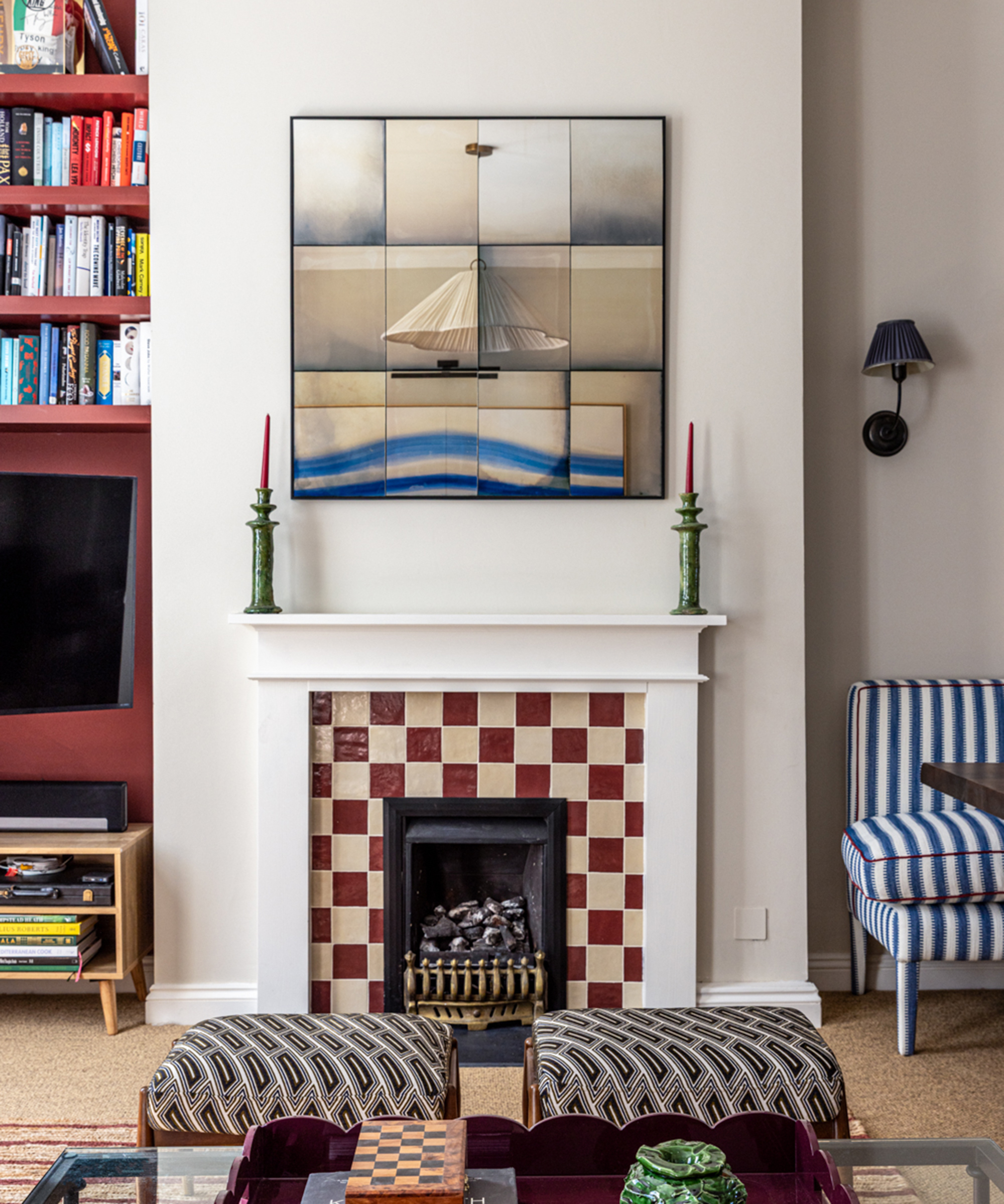 living room with checkerboard fireplace and antique mirror above it