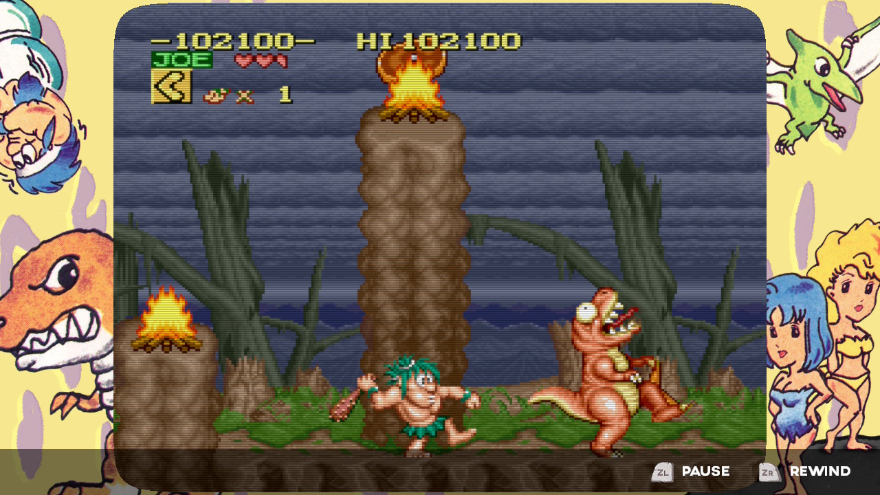 A cavemen hits a dinosaur in Joe &amp;amp; Mac Retro Collection