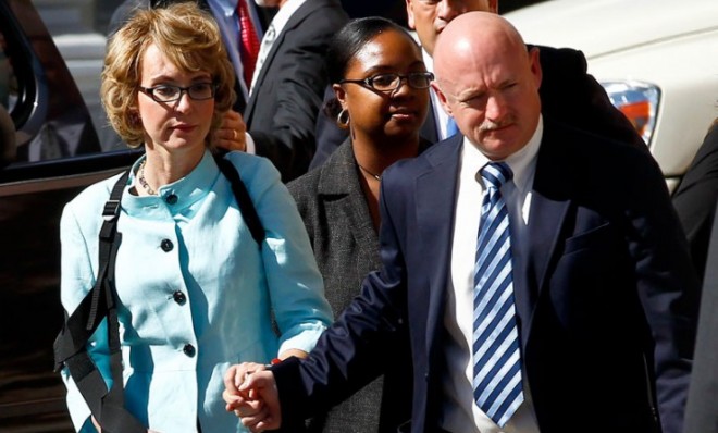 Former Democratic Rep. Gabrielle Giffords, and her husband Mark Kelly are seen after the sentencing of Tucson shooter, Jared Lee Loughner, on Nov. 8, 2012.