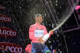 Svein Tuft (Orica-GreenEdge) celebrates his first time in a Grand Tour leader's jersey