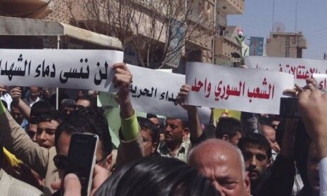 Thousands of anti-government Syrian demonstrators took to the streets Friday shouting &amp;quot;God, Syria, Freedom&amp;quot; in demand of democratic reforms.