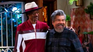 George (George Lopez) embraces his sponsor Calvin (Snoop Dogg) in Lopez vs Lopez season 2