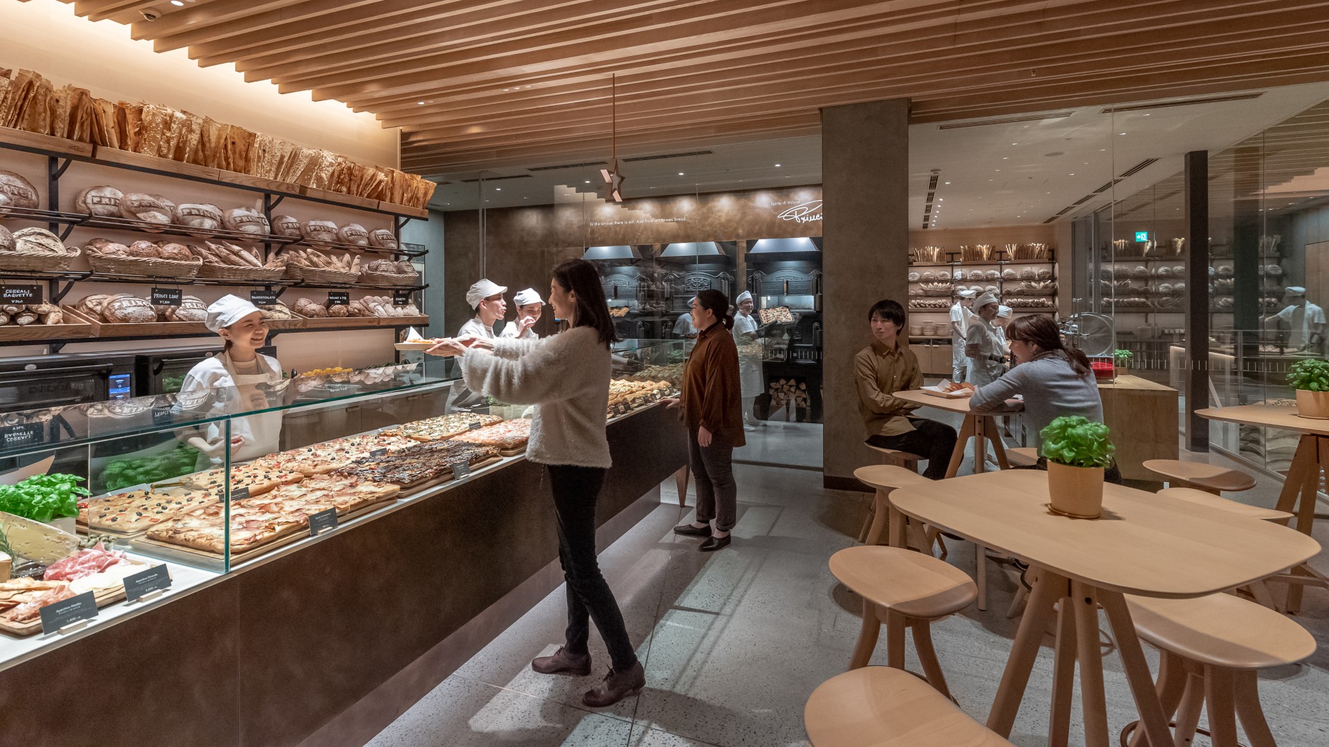 People ordering at the counter in Starbucks cafe