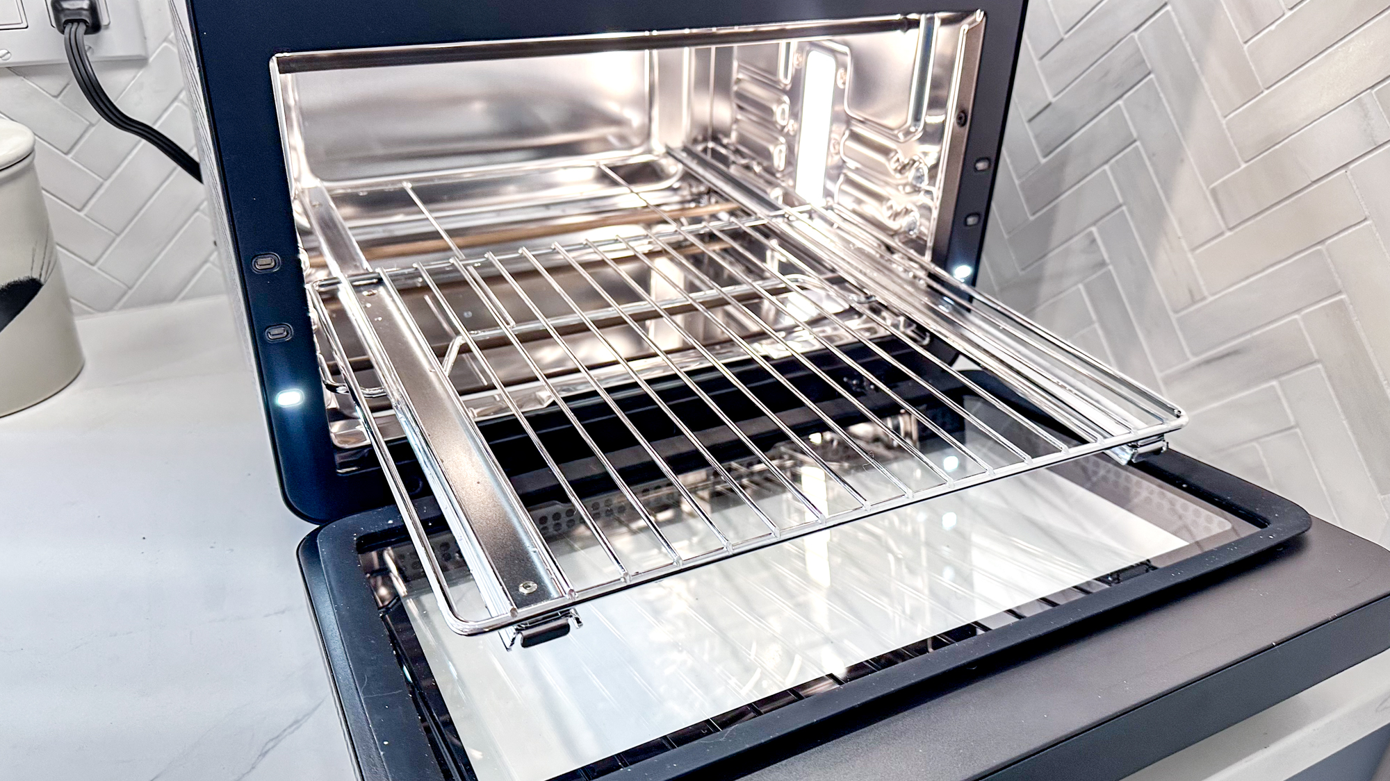 CHEF iQ MiniOven on a kitchen counter