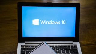 Windows 10 operating system logo displayed on a laptop screen 