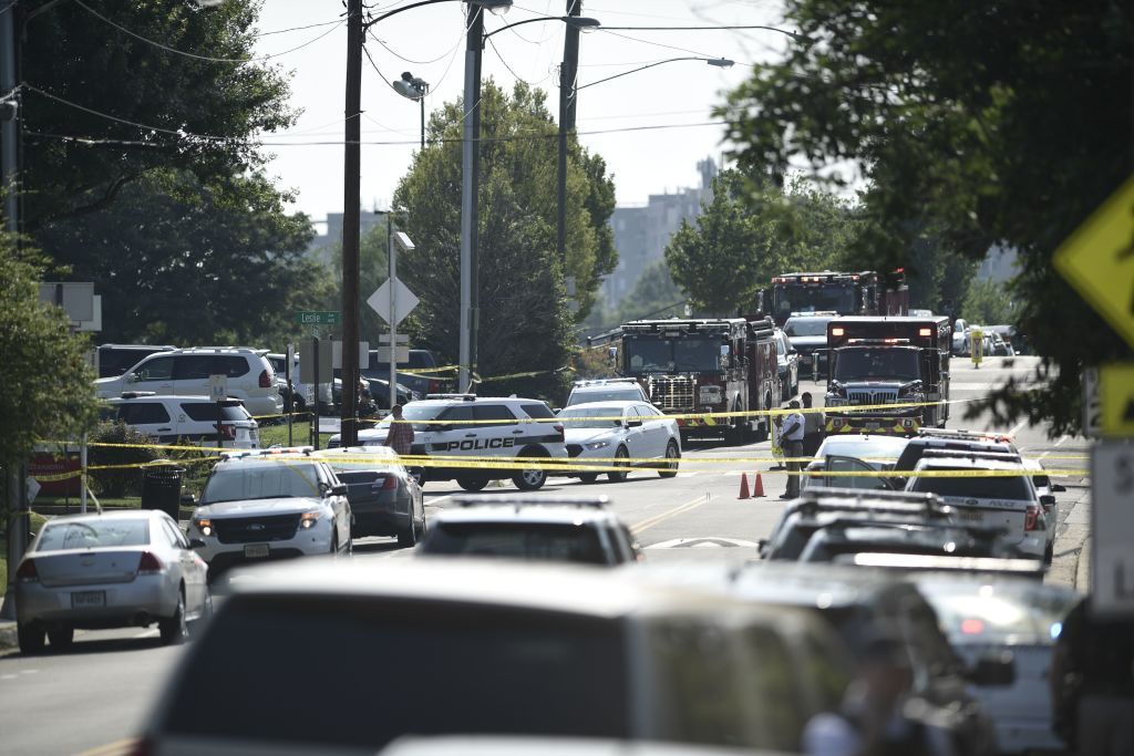 Emergency vehicles at scene of shooting.