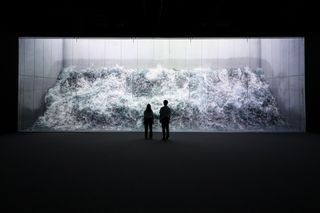 Image of waves crashing on a screen