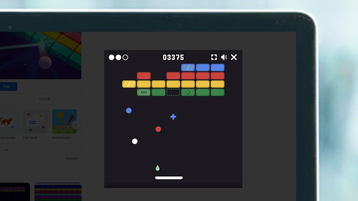 A laptop screen showing Google&#039;s Block Breaker game