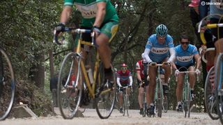 Felice Gimondi battles up a gravel climb