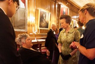 Princess Anne talking to a woman at the Palace of Holyroodhouse in 2024