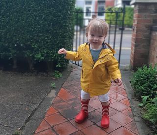 Toddler stood on path