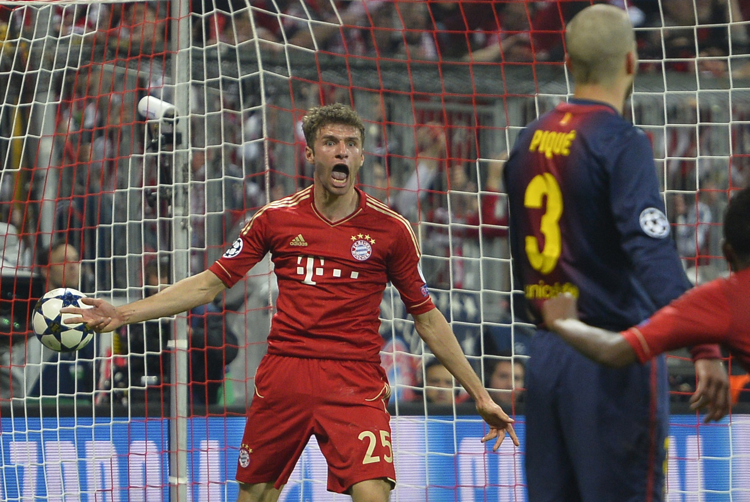 Thomas Muller celebrates after scoring for Bayern Munich against Barcelona in the Champions League semi-finals in April 2013.