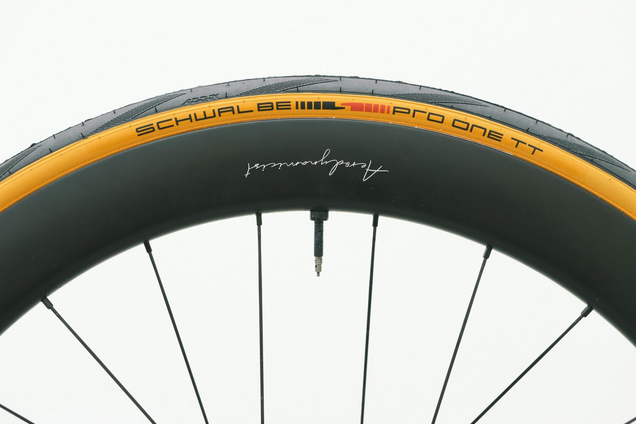 A tan bicycle tyre on a white background