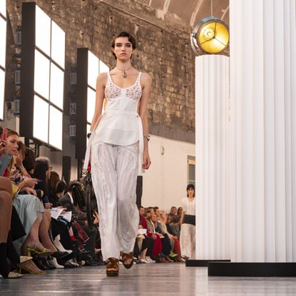 Model Grace Hartzel walks the runway at the Chloé fashion show.