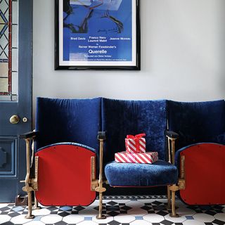 Christmas hallway with blue velvet cinema chairs