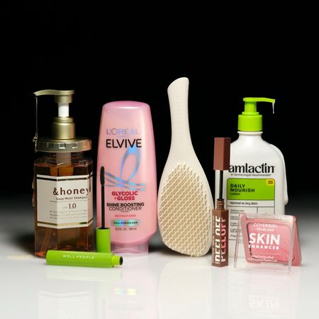 a selection of drugstore beauty products on a black background with a white foreground