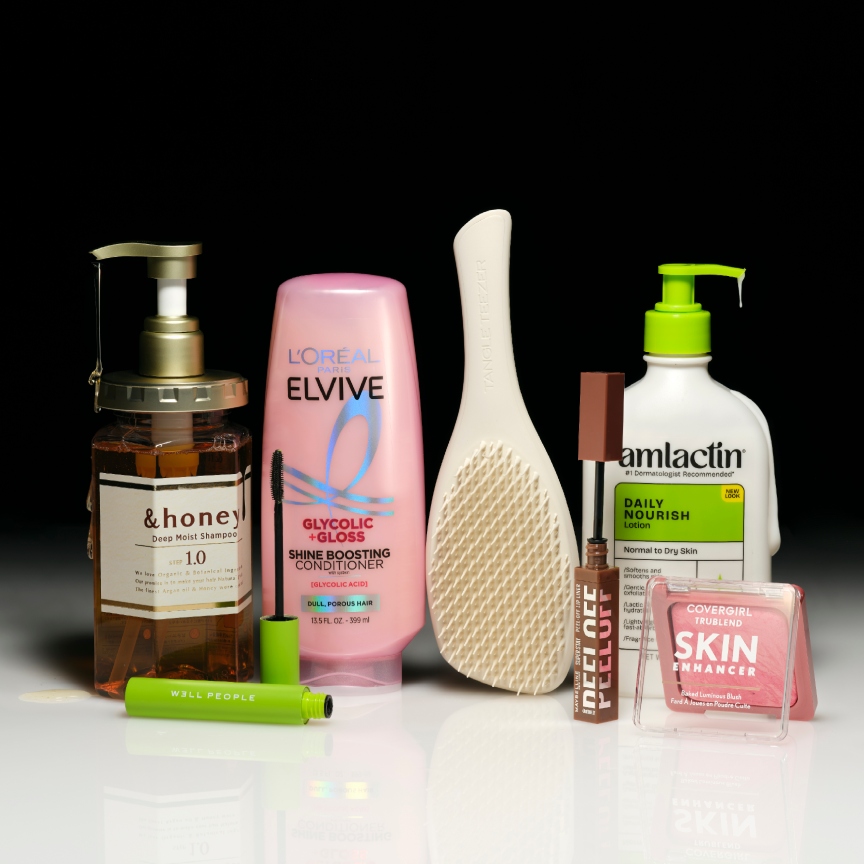 a selection of drugstore beauty products on a black background with a white foreground