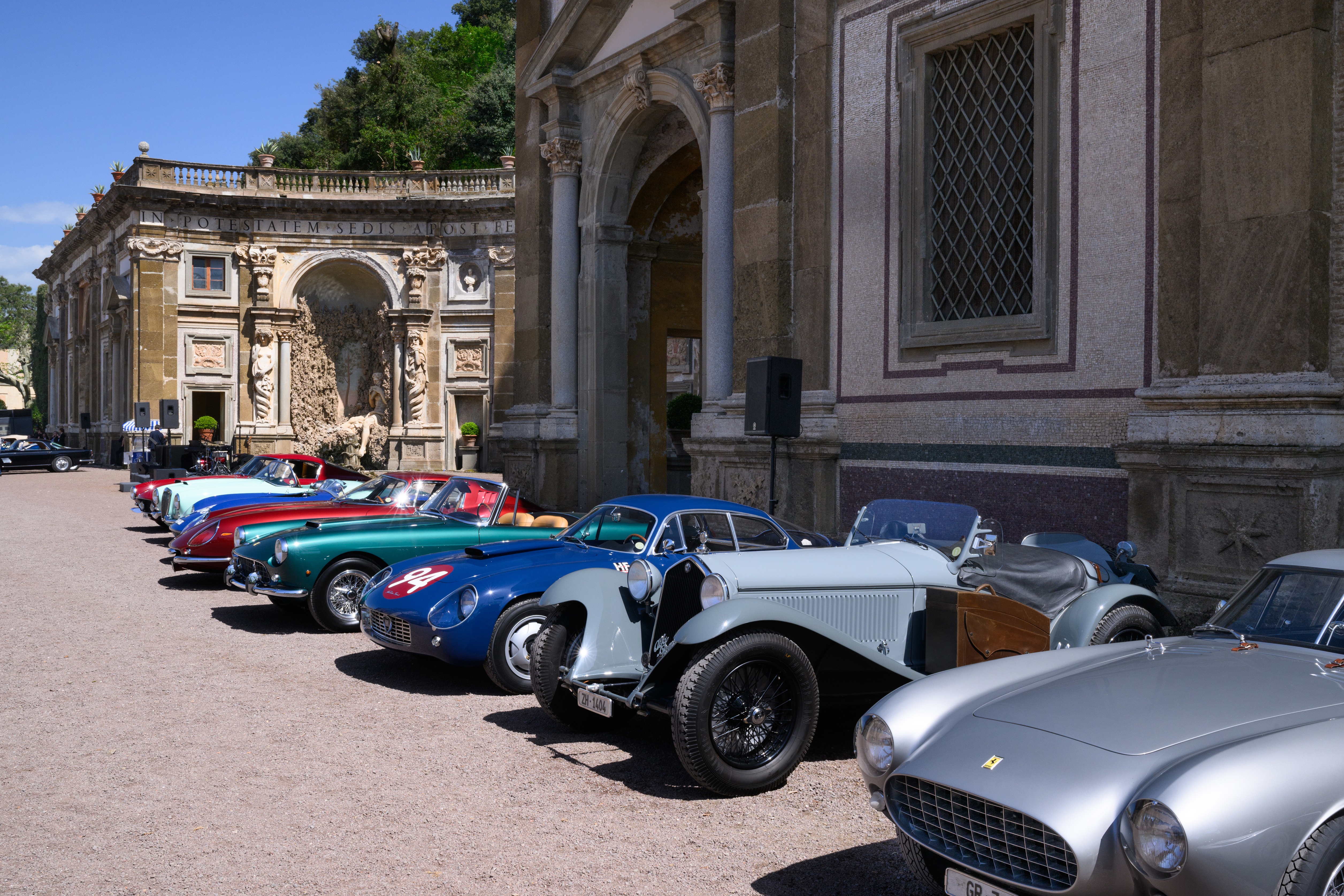 Historic Alfa Romeos, Ferraris, a Bizzarrini and a Lamborghini Miura are displayed and driven through Rome during Anantara Concorso Roma, celebrating automotive design and heritage.