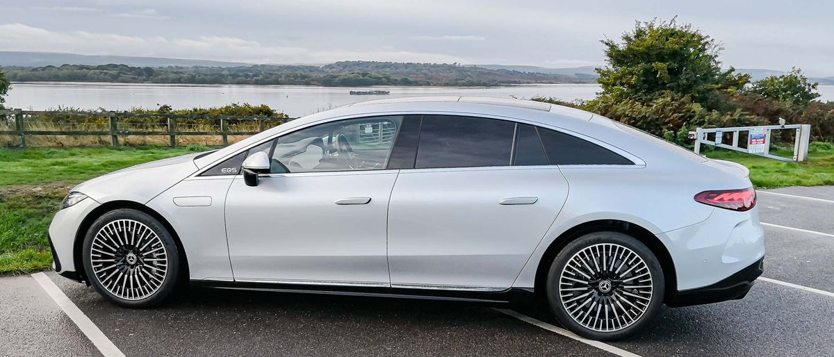 Mercedes Benz EQS Sedan parked outside by lake