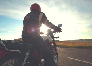 sun set above bike rider photography