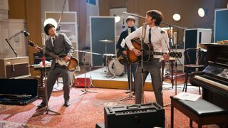 Paul McCartney (George Caple), George Harrison (Philip Davies) and John Lennon (Chris Mason) performing together as The Beatles in Doctor Who season 14 episode 2