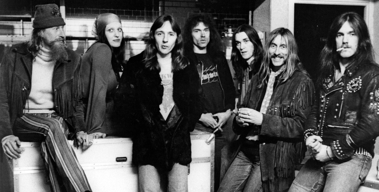 Nik Turner, Stacia, Alan Powell (?), Simon House, Simon King, Dave Brock, and Lemmy Kilmister of the space rock band "Hawkwind" pose for a portrait in circa 1973. (Photo: Michael Ochs)