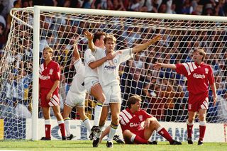 Best Leeds United retro shirts 2022: Leeds' best classic football shirts ever: Leeds striker Lee Chapman celebrates his late equaliser during a Premier League match between Leeds United and Liverpool at Elland Road on August 29, 1992 in Leeds, England