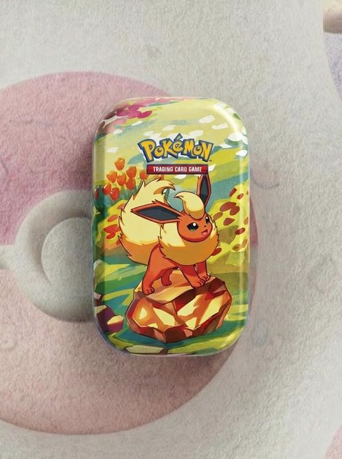 Scarlet & Violet &mdash;prismatic Evolutions Mini Tin - Flareon (2 Booster Packs & 1 Coin)