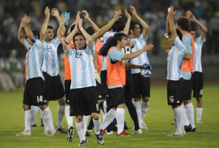 Lionel Messi celebrates with his Argentina team-mates after victory over Brazil at the 2008 Olympics.