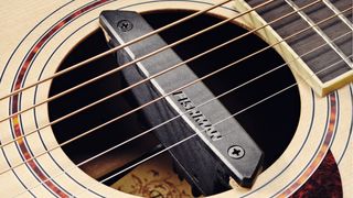 A Fishman Rare Earth single-coil acoustic guitar pickup fitted to the soundhole of an acoustic guitar, during a studio shoot for Guitarist Magazine, March 6, 2008. 